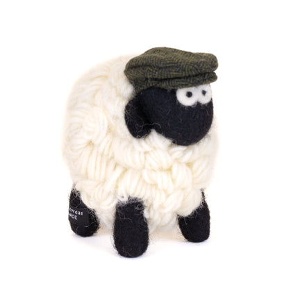 Knit wool sheep with a brown flat cap