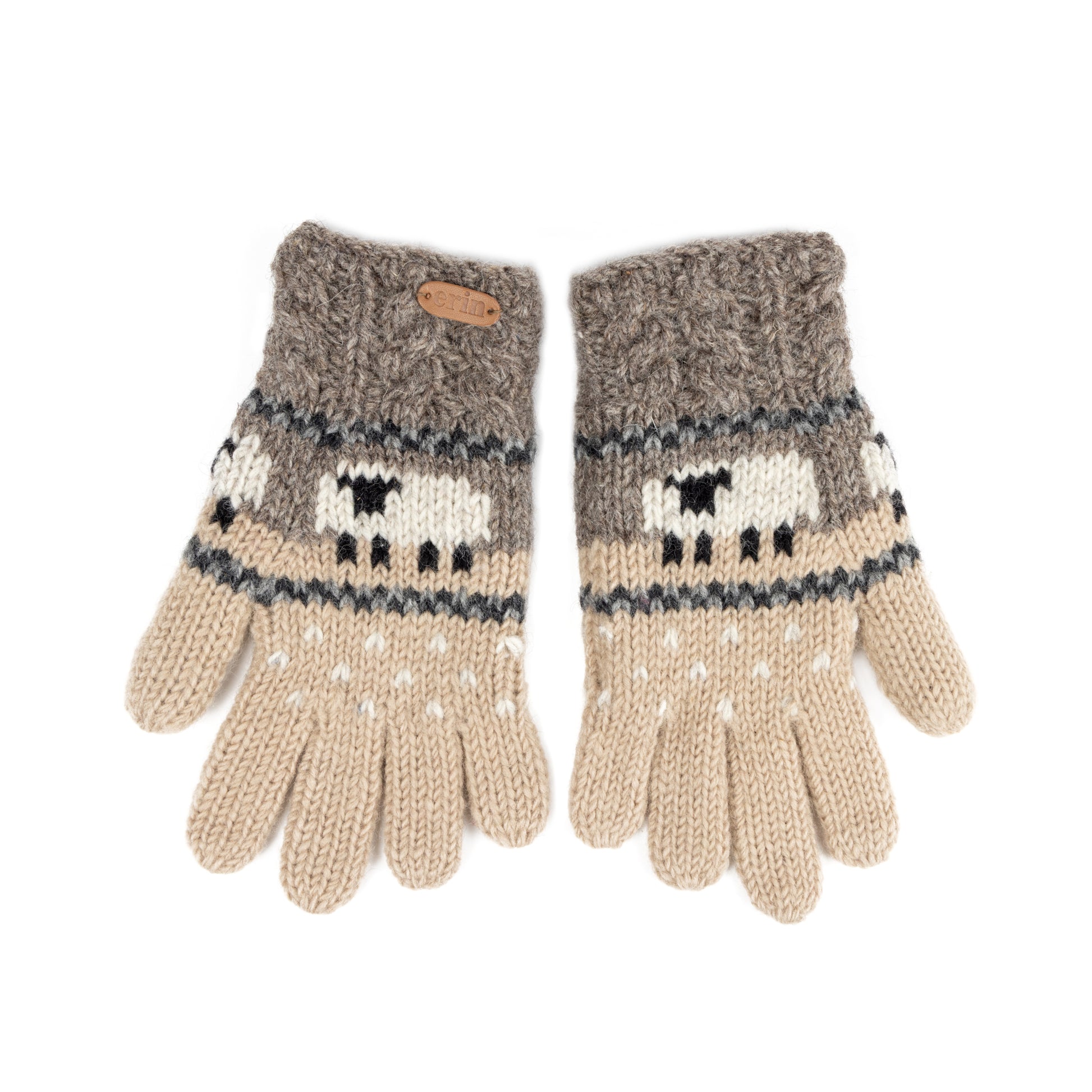 A pair of aran cable knit gloves in grey and beige with sheep design.