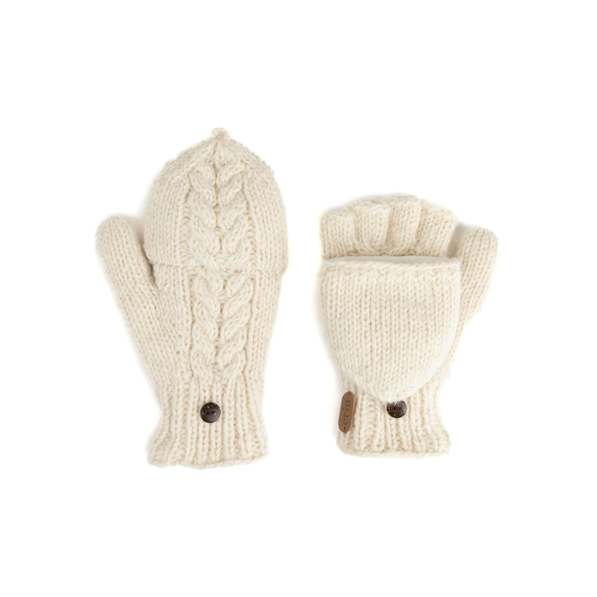 Pair of white knit mittens with buttons on the wrist. Top of one mitten is removed to reveal fingerless gloves underneath. 