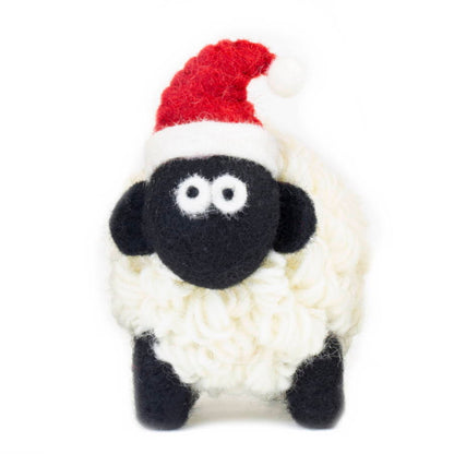 Knitted sheep figurine with felt santa hat.