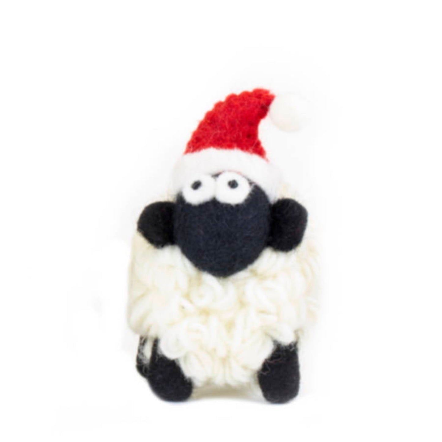Knitted sheep figurine with felt santa hat.