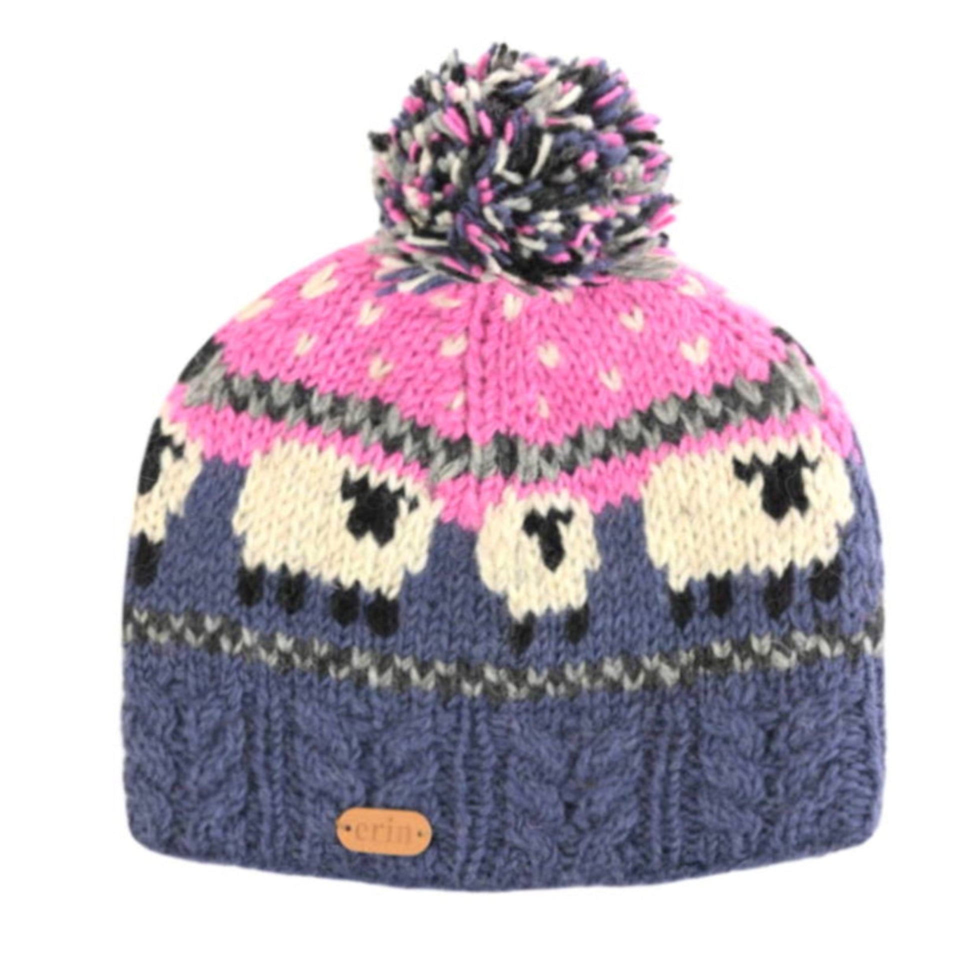 A pink, blue, and white wool bobble hat with a sheep pattern.