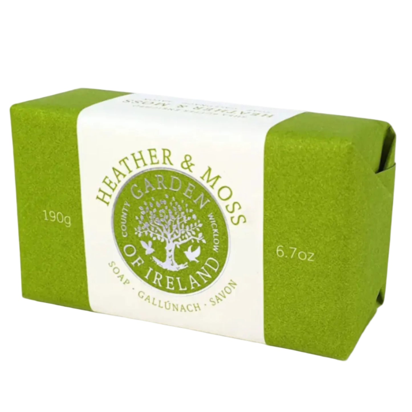 A bar of heather and moss soap in green and white paper packaging