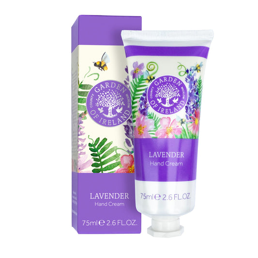 A tube of lavender hand cream next to a purple floral patterned box. 