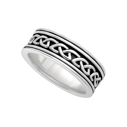 Silver ring with intricate Celtic knot design on a white background