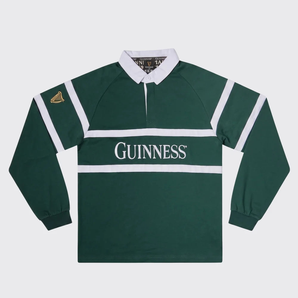 A dark green long-sleeve rugby shirt with white stripes, a white collar, and 'GUINNESS' printed across the chest, shown on a light gray background.