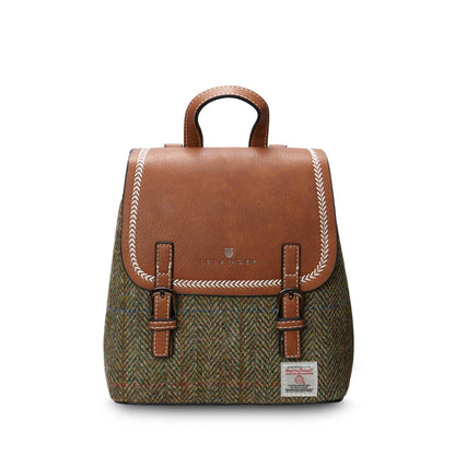 A green herringbone Mini Jura backpack with a PU leather body and a Harris Tweed front panel, featuring a magnetic clasp, hidden zip pocket, reinforced handle, and adjustable shoulder straps.