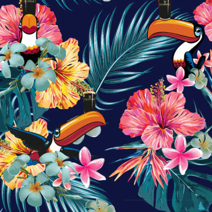 Close-up of the shirt's pattern. Various tropical flowers and large leaves on a navy background. Toucans holding Guinness on their beaks dispersed throughout. 