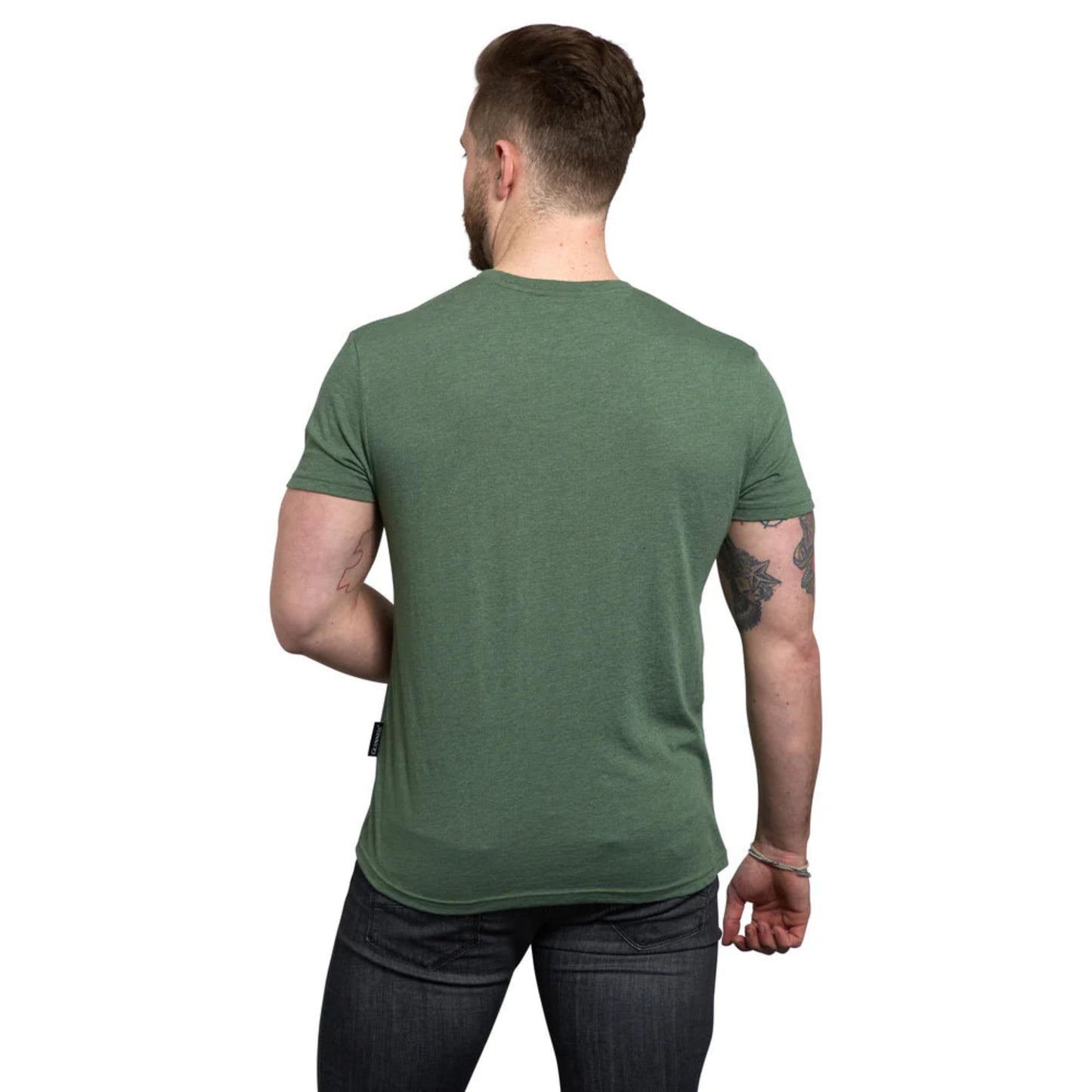 Man turned around to show the back of his green tee shirt. 