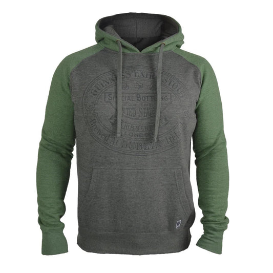 A raglan pullover hoodie with a dark heather gray body and olive green sleeves and hood lining, featuring a faded circular graphic on the chest and a front kangaroo pocket.