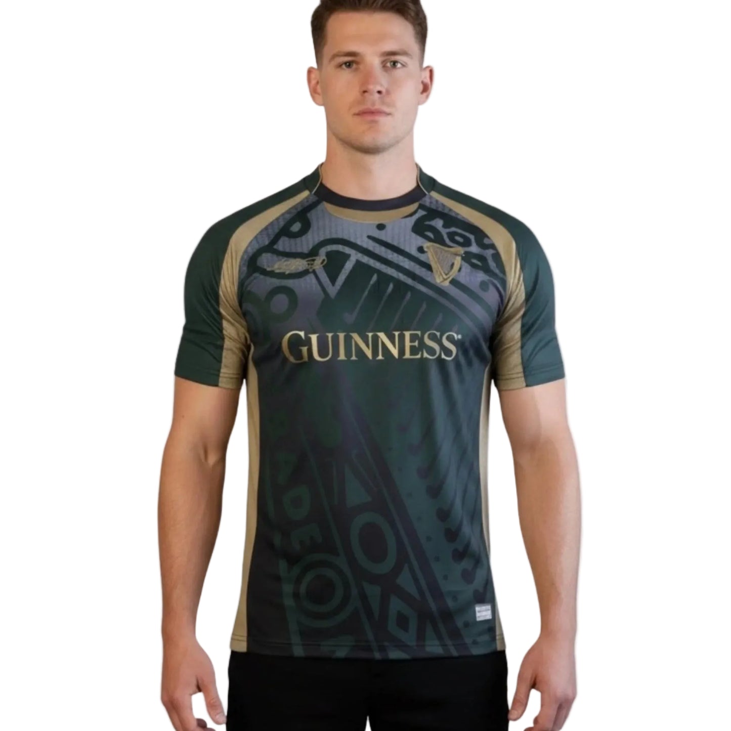 Man wearing a green and black sports jersey with 'Guinness' branding on a white background