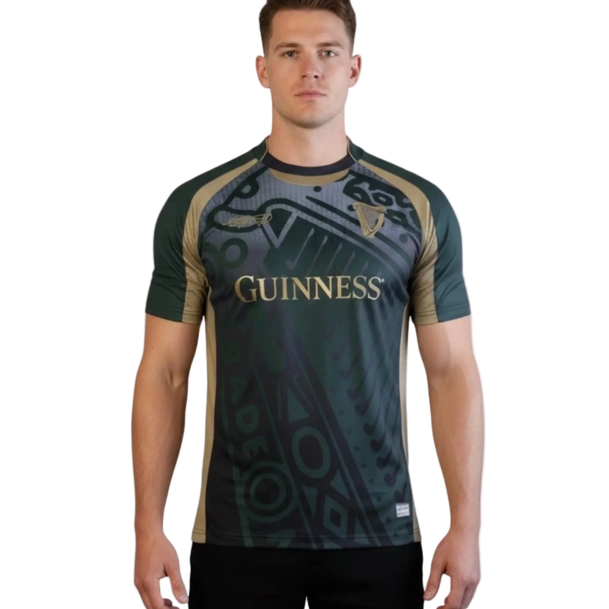 Man wearing a green and black sports jersey with 'Guinness' branding on a white background