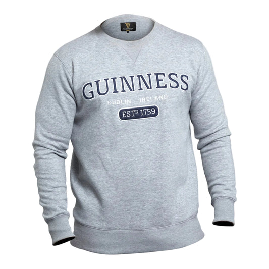 Grey crew neck sweatshirt with the word "Guinness" embroidered across the chest, followed by "Dublin - Ireland" and "ESTd 1759."