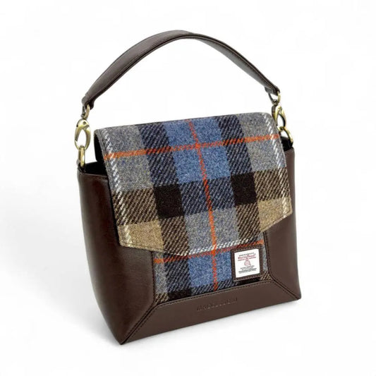 Handbag with plaid flap and brown body on a white background
