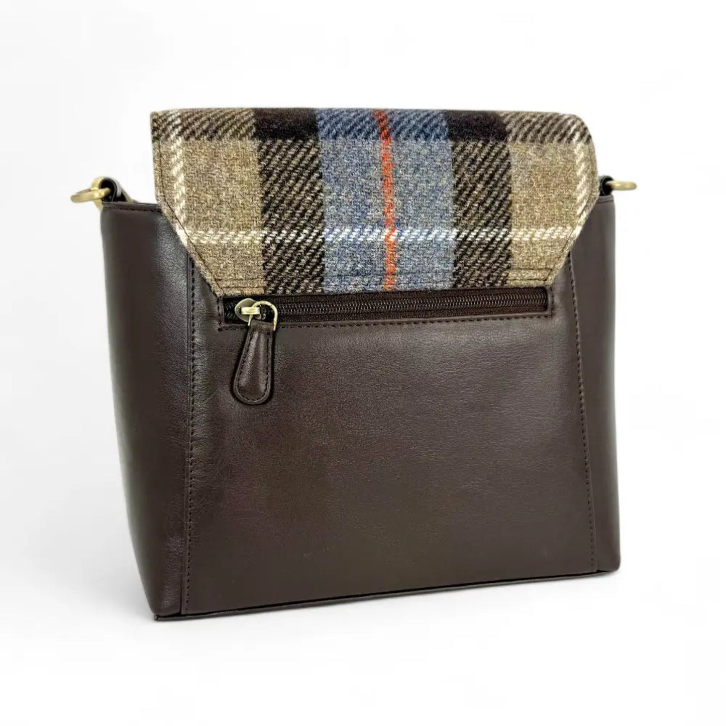 Brown leather handbag with plaid flap on a white background