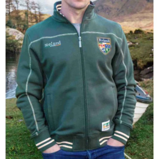 Man wearing a green jacket with 'Retro Irish Heritage Collection' branding outdoors.