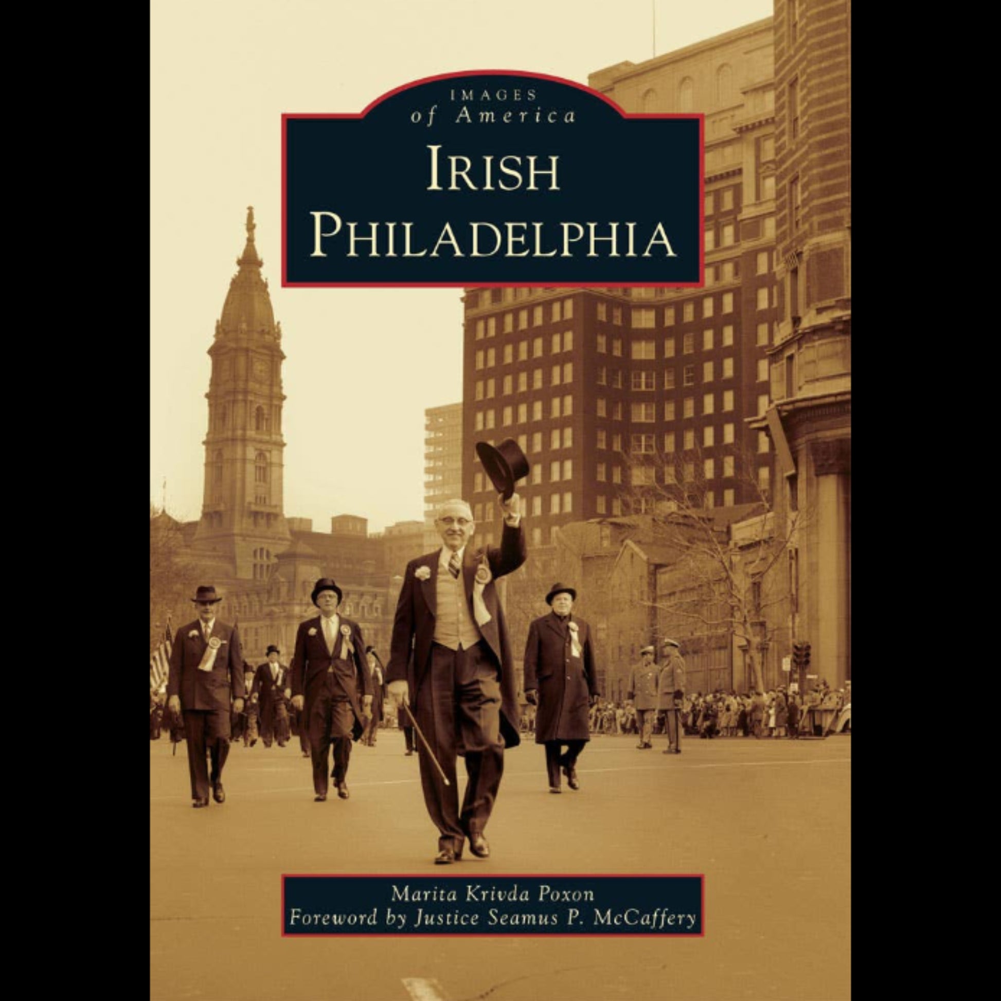 Book cover of 'Irish Philadelphia' with vintage photograph of a man in a suit walking down a street.