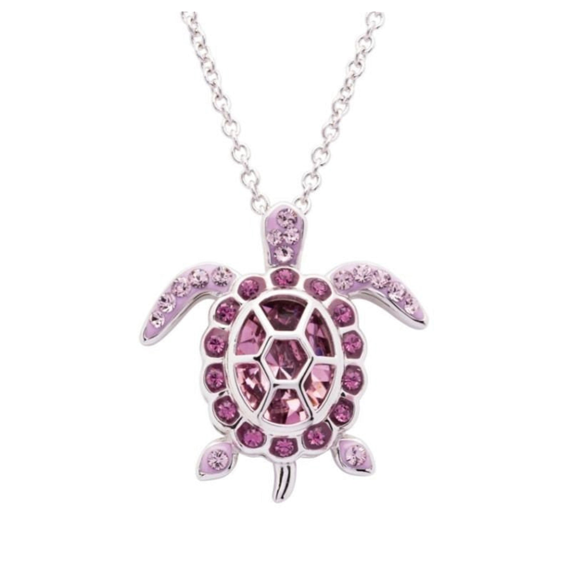Pink turtle pendant necklace on a white background
