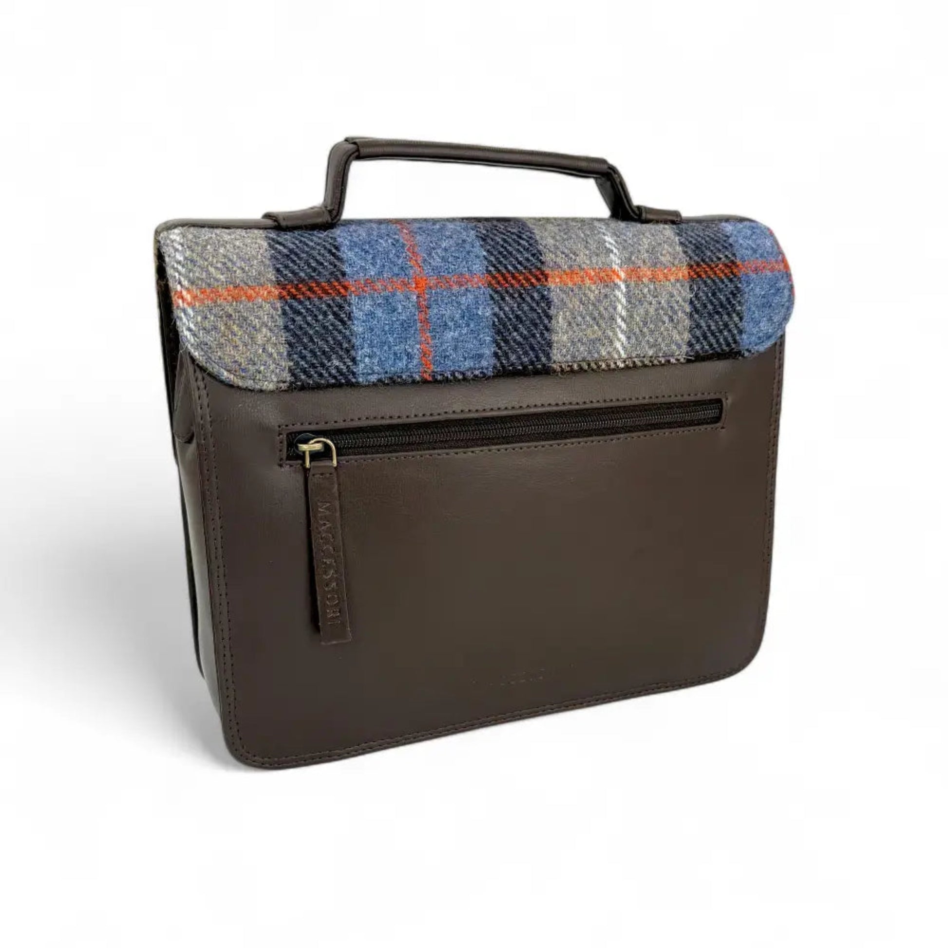 Brown leather bag with plaid fabric flap on a white background