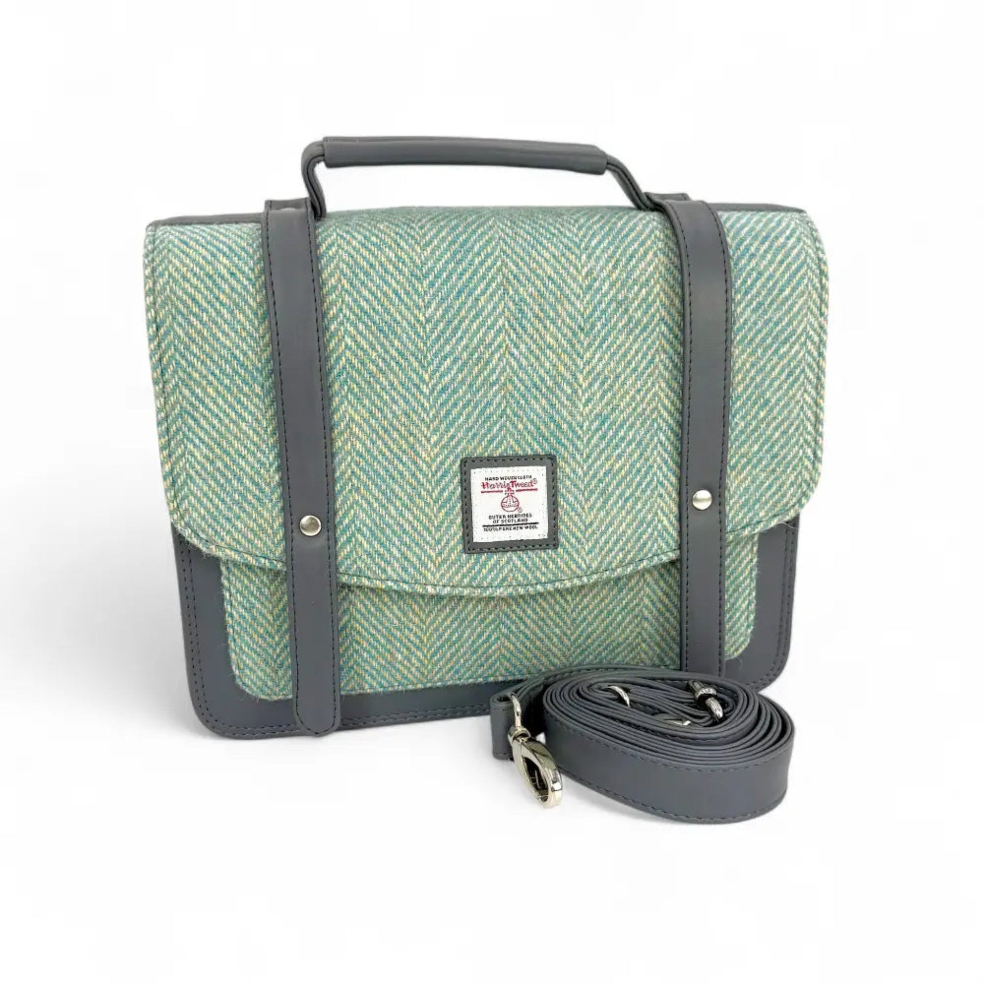 Green herringbone patterned bag with gray straps and a visible brand label on a white background