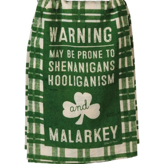 Green and white checkered towel with text and shamrock on a hanger
