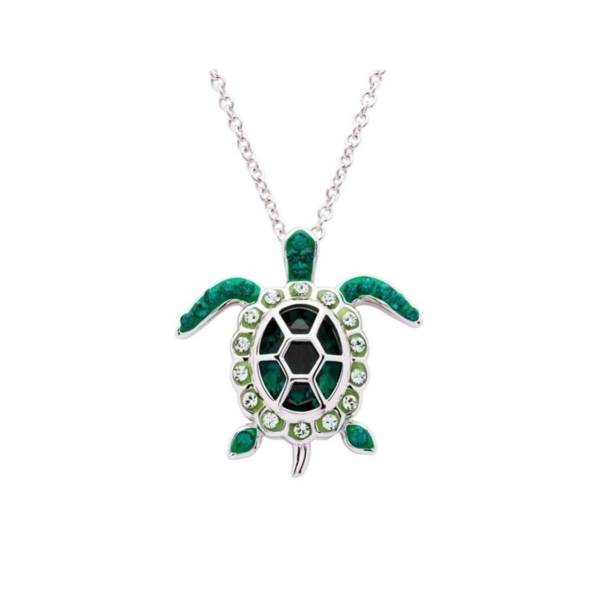 Turtle-shaped pendant necklace with green accents on a white background