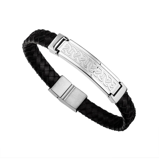 A stainless steel bracelet with a black leather strap and a Celtic patterned plate.