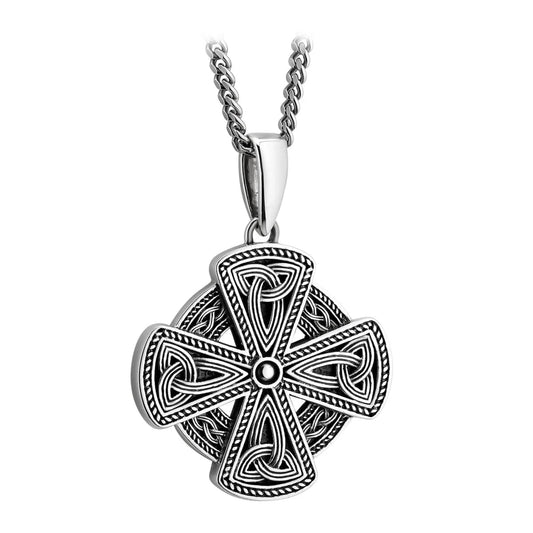 Silver Celtic cross pendant on a chain against a white background