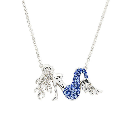 Mermaid tail necklace with blue gemstones on a white background