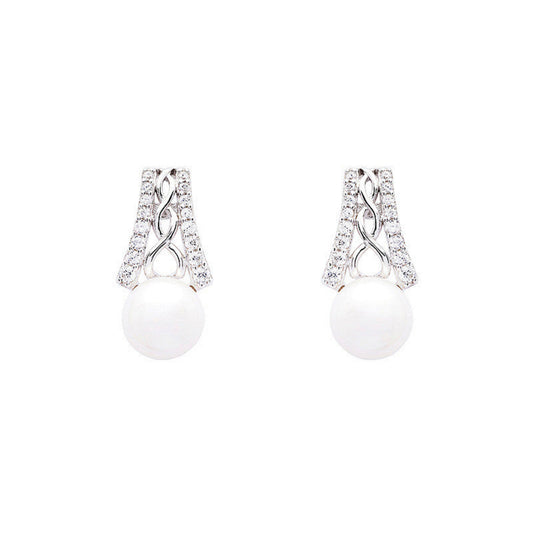 Pair of earrings with white spherical stones and silver designs on a white background