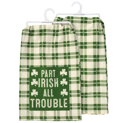 Green and white checkered towels with shamrock design on a hanger