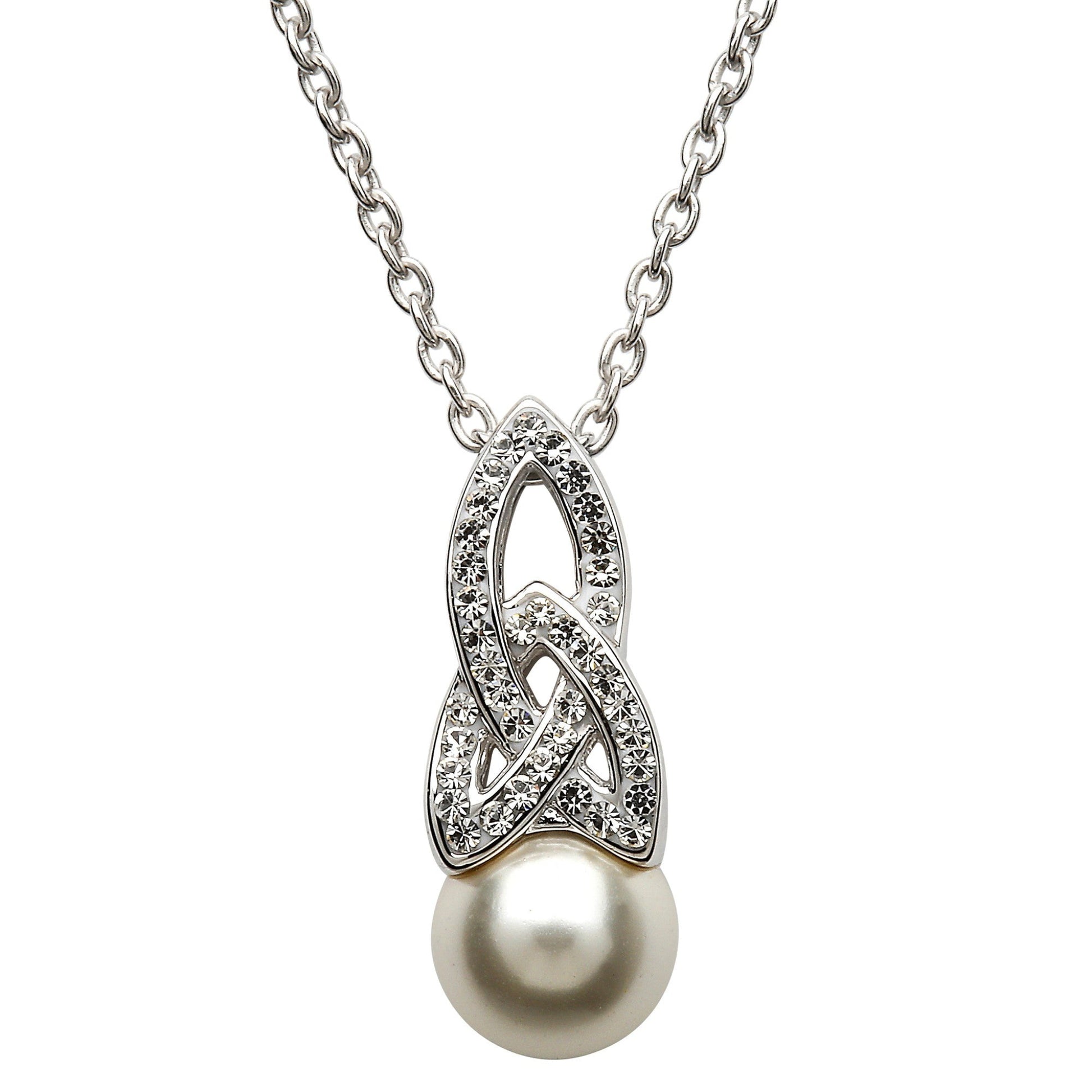 A Celtic pearl necklace adorned with sparkling crystals, featuring a round white pearl as the central stone, suspended from a decorative silver knotwork charm, on a silver belcher chain.