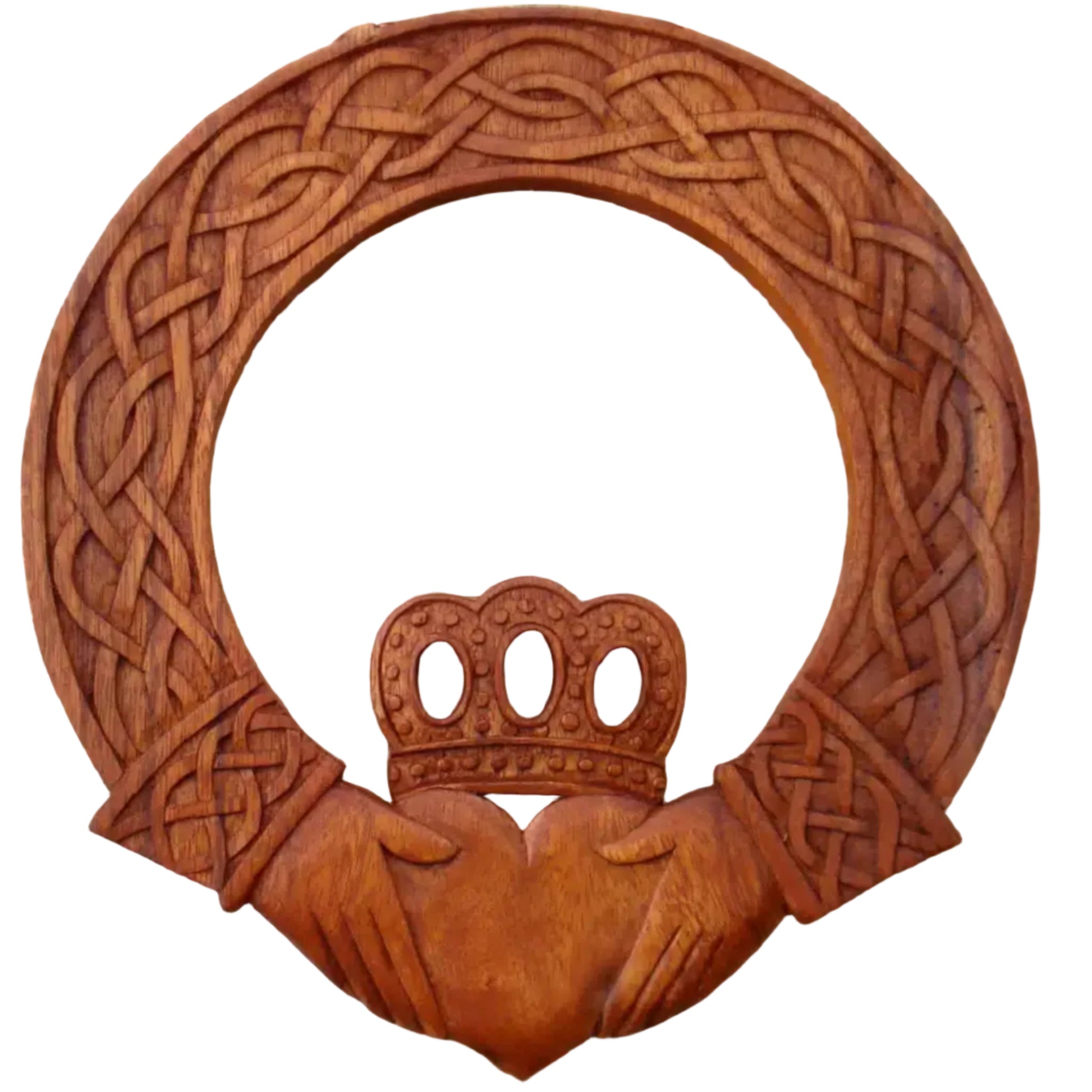 Wooden Claddagh symbol with intricate Celtic knot design on a stone background