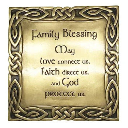 Decorative bronze plaque with a celtic knotwork border and the engraved text "family blessing / may love connect us, faith direct us, and god protect us"