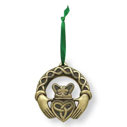 Bronze claddagh ornament with embossed knotwork and a green ribbon hanger.