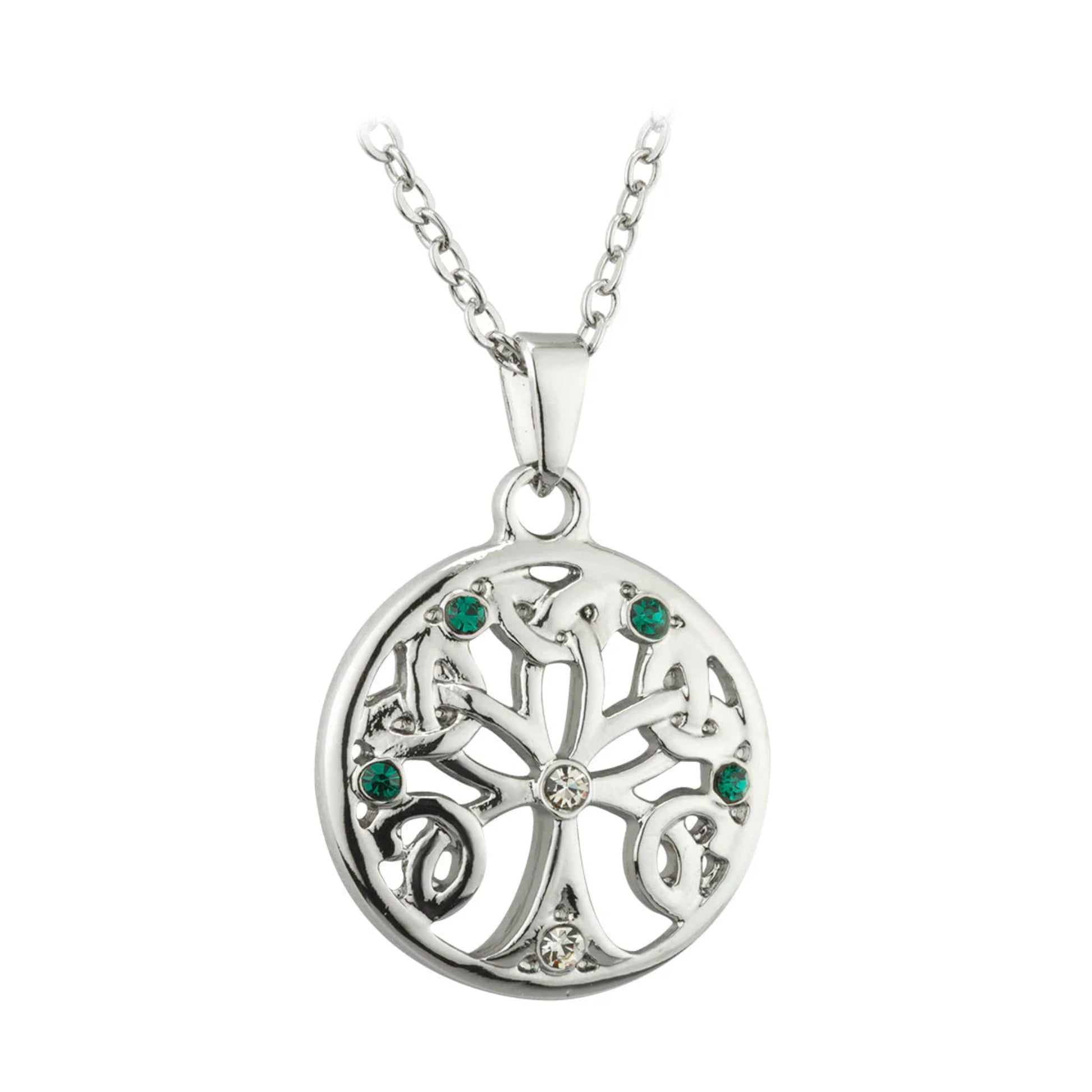 A rhodium necklace with a round pendant. The pendant features an intricate tree of life. Each branch ends in a trinity knot. The base and center of the tree feature two clear white stone inlays. The branches feature four green ones.