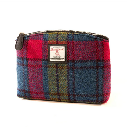 Plaid pouch with a visible brand label on a white background