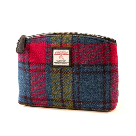 Plaid pouch with a visible brand label on a white background