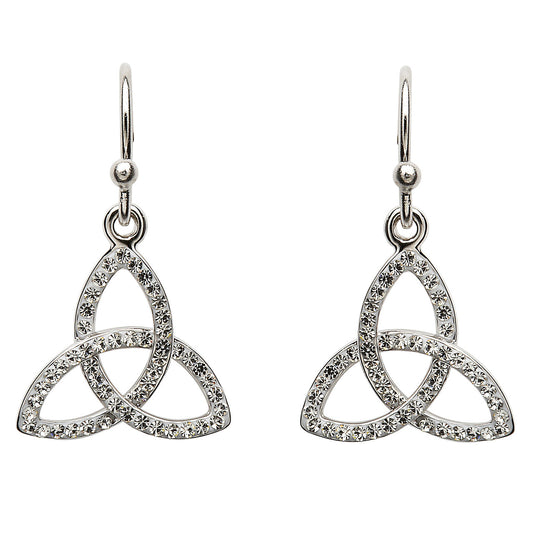 A pair of silver-toned triquetra knot dangle earrings, each featuring a triangular interlocking knot design paved with small clear cubic zirconia stones on a plain white background.