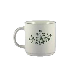 White mug with a black floral design on a light gray background