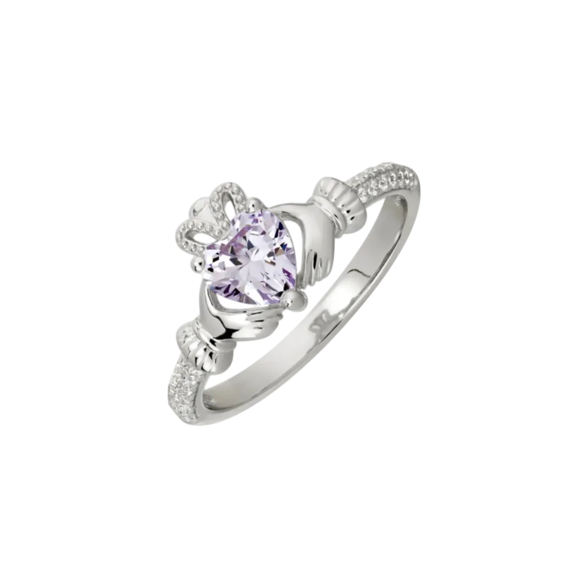 A sterling silver claddagh ring with a lavender heart-shaped gem in the center.