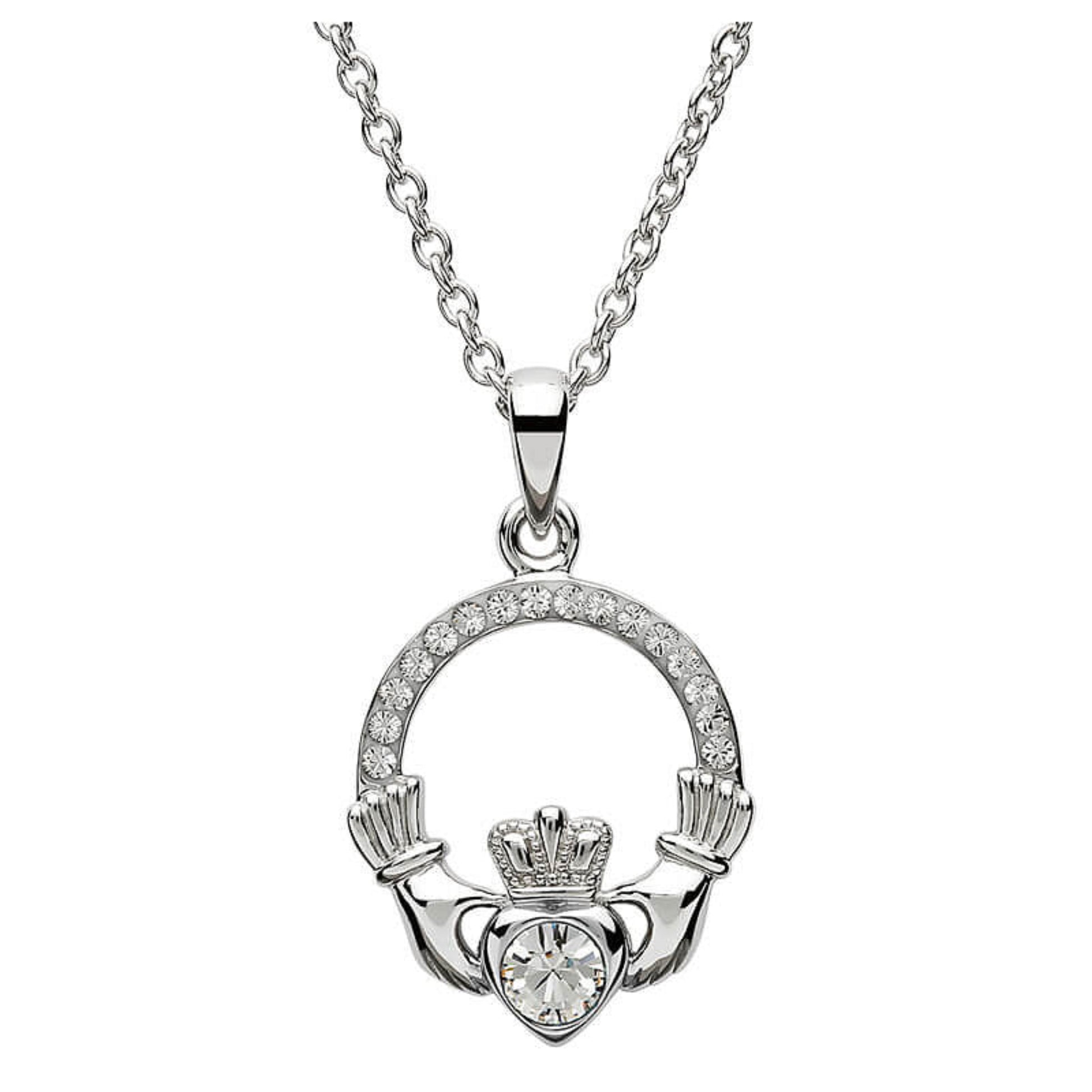 Silver claddagh pendant encrusted with white gems. The heart in the center contains one larger white gem. 