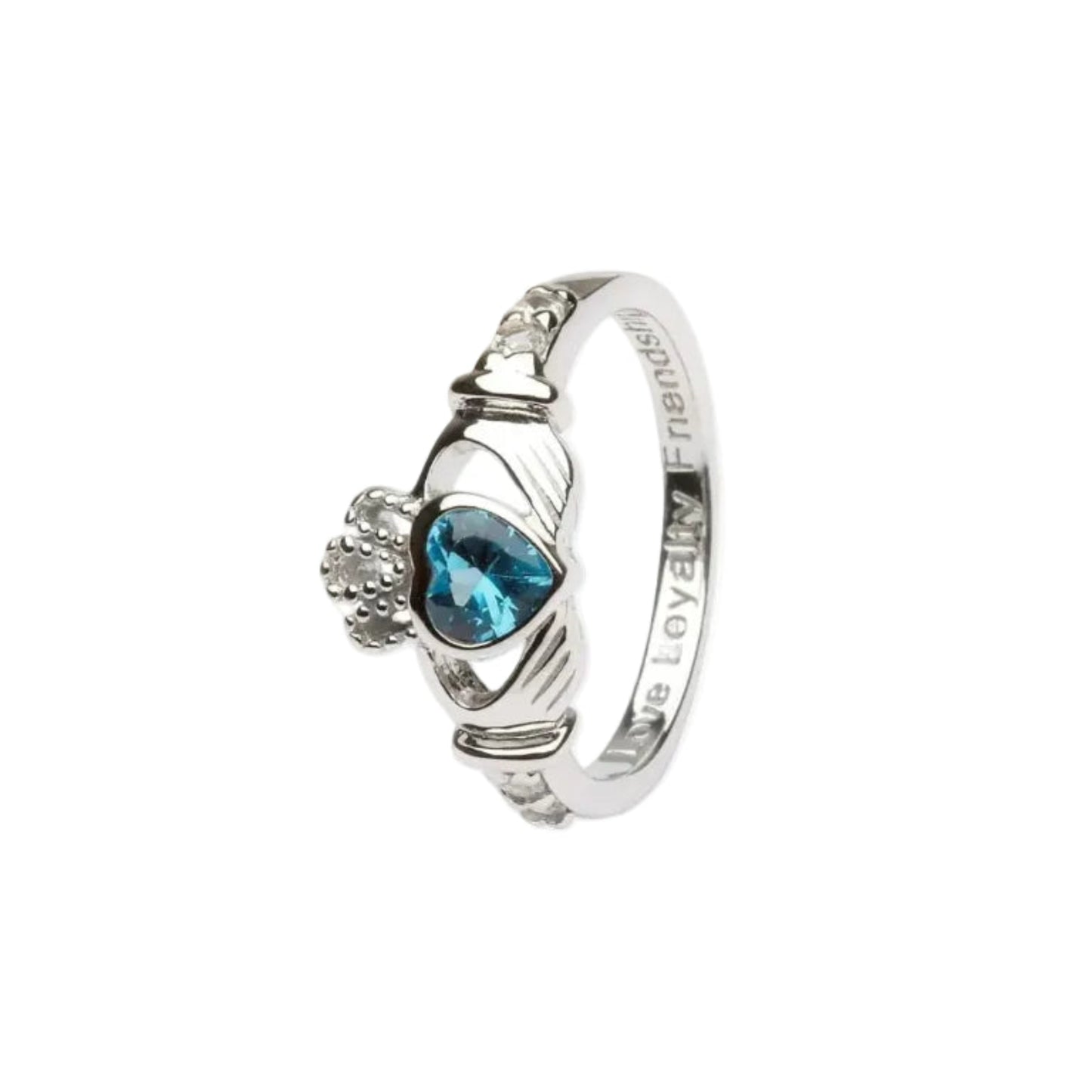 A sterling silver claddagh ring with a blue heart-shaped gem in the center.