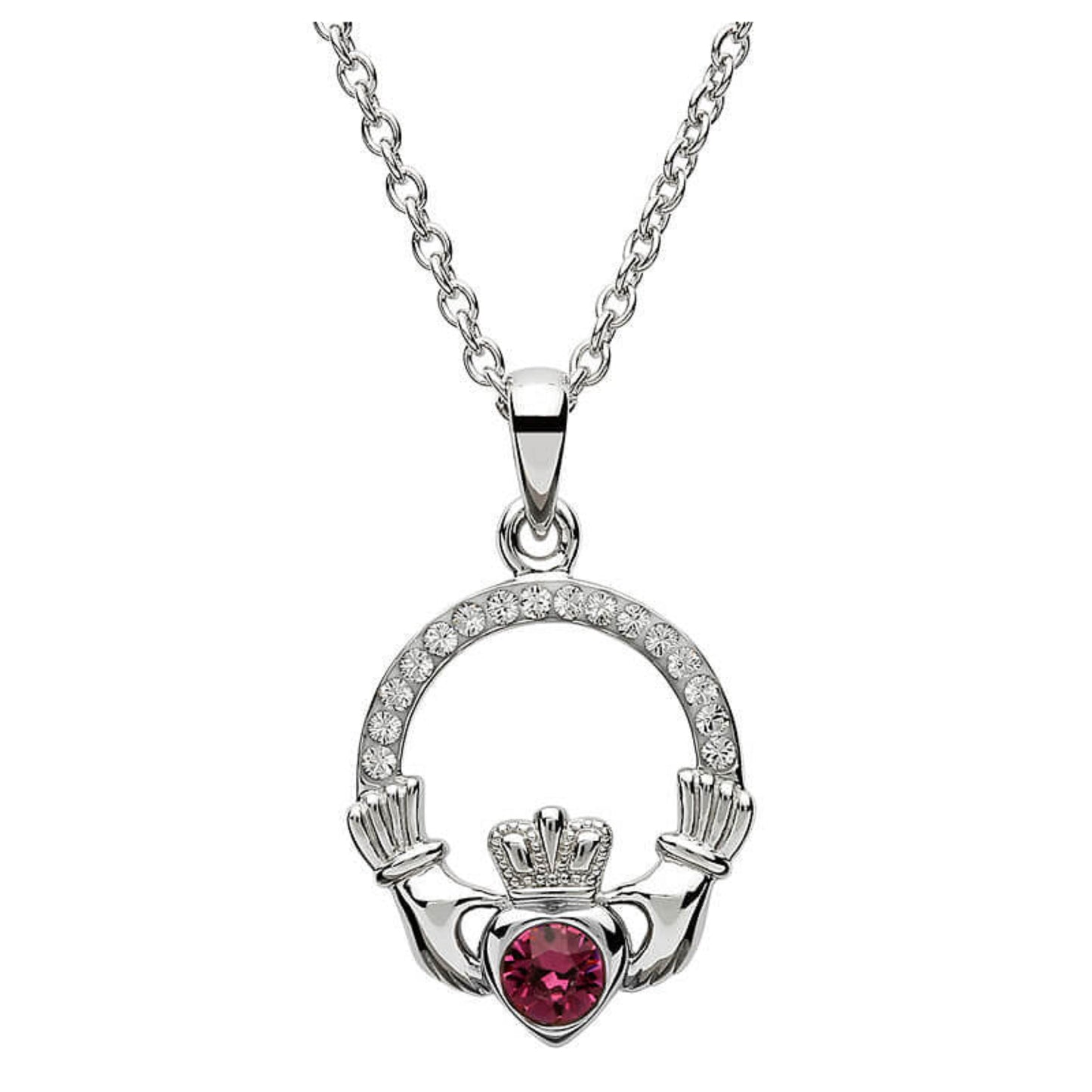 Silver claddagh pendant encrusted with white gems. The heart in the center contains one larger pink gem. 