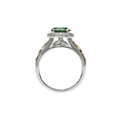 Sterling silver ring with a central green gemstone.