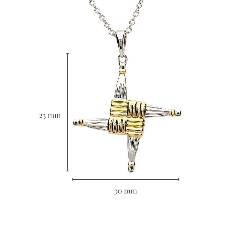 Gold and silver pendant with measurements on a white background
