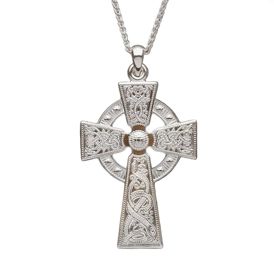Silver Celtic cross pendant on a white backgrounds