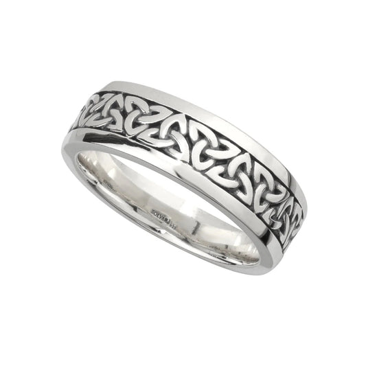 Silver ring with Celtic knot design on a white background