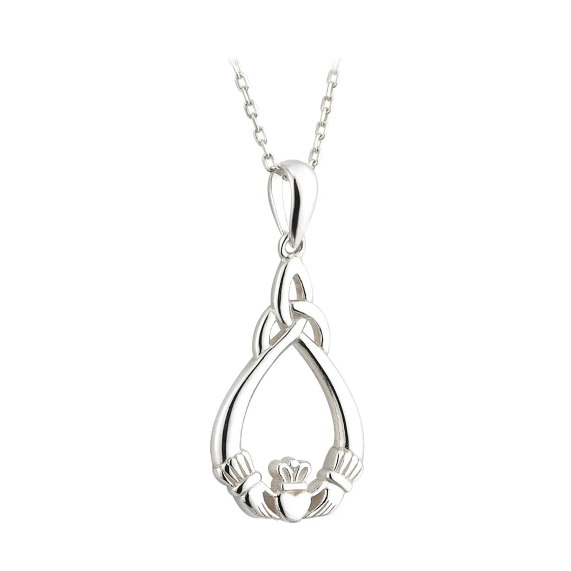 Silver claddagh pendant on a chain against a white background