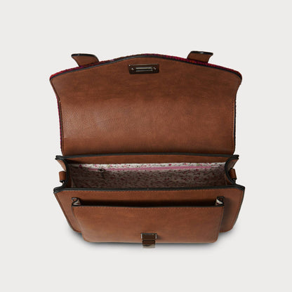 Brown leather bag with open front pocket on a light gray background